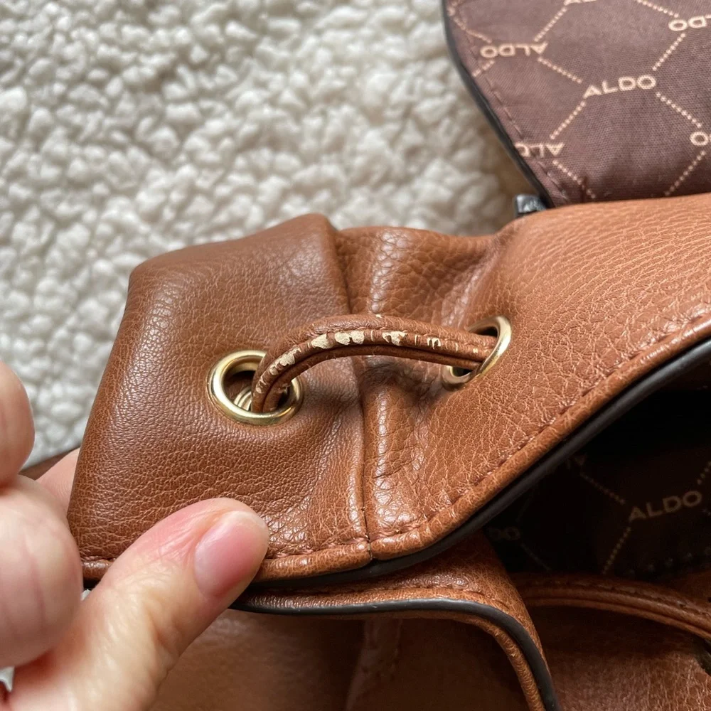 ALDO Drawstring Brown Backpack Adjustable Straps Snap Flap Closure - Picture 10 of 16